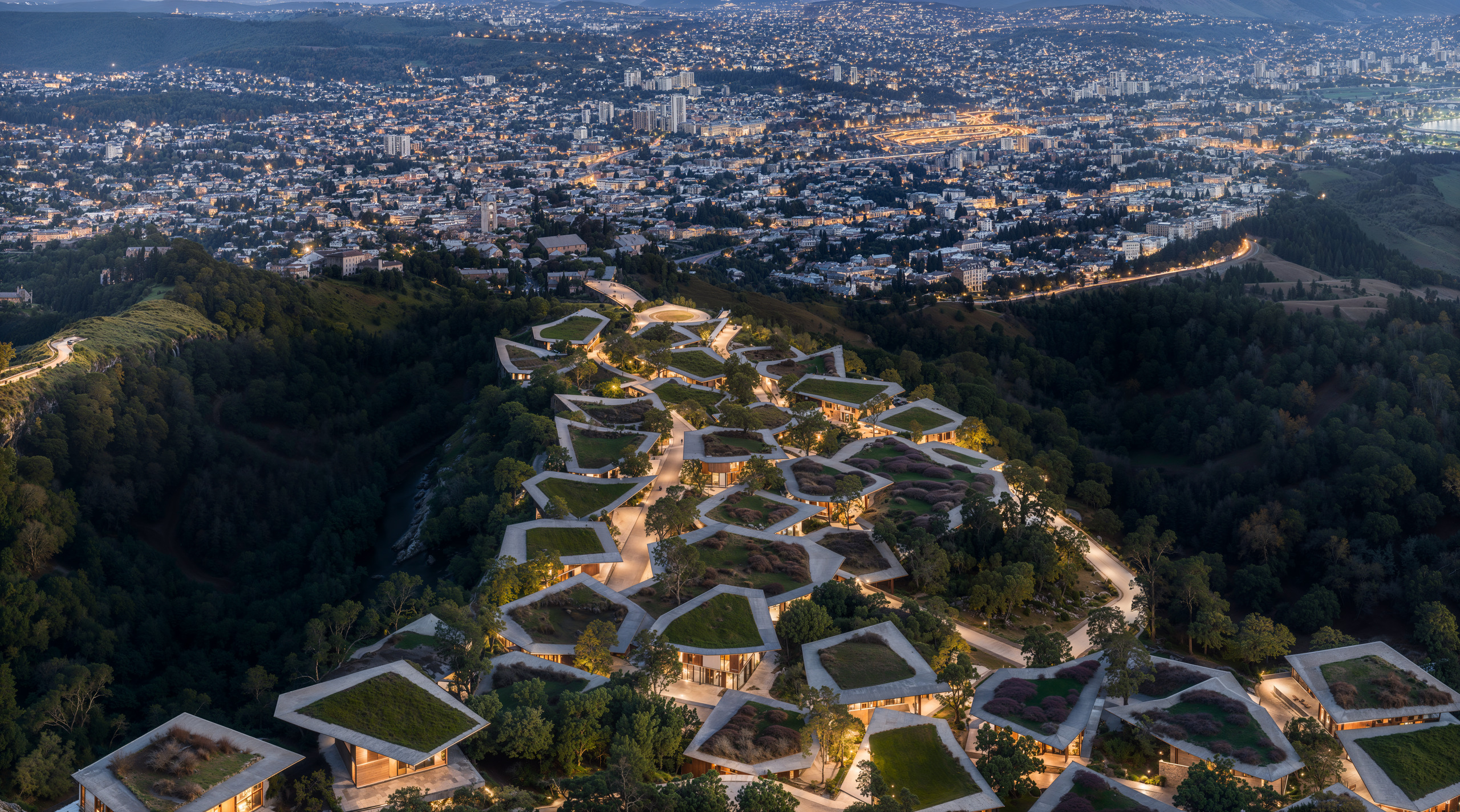 Mira Verde on the hillside at dusk with Tbilisi spread out below