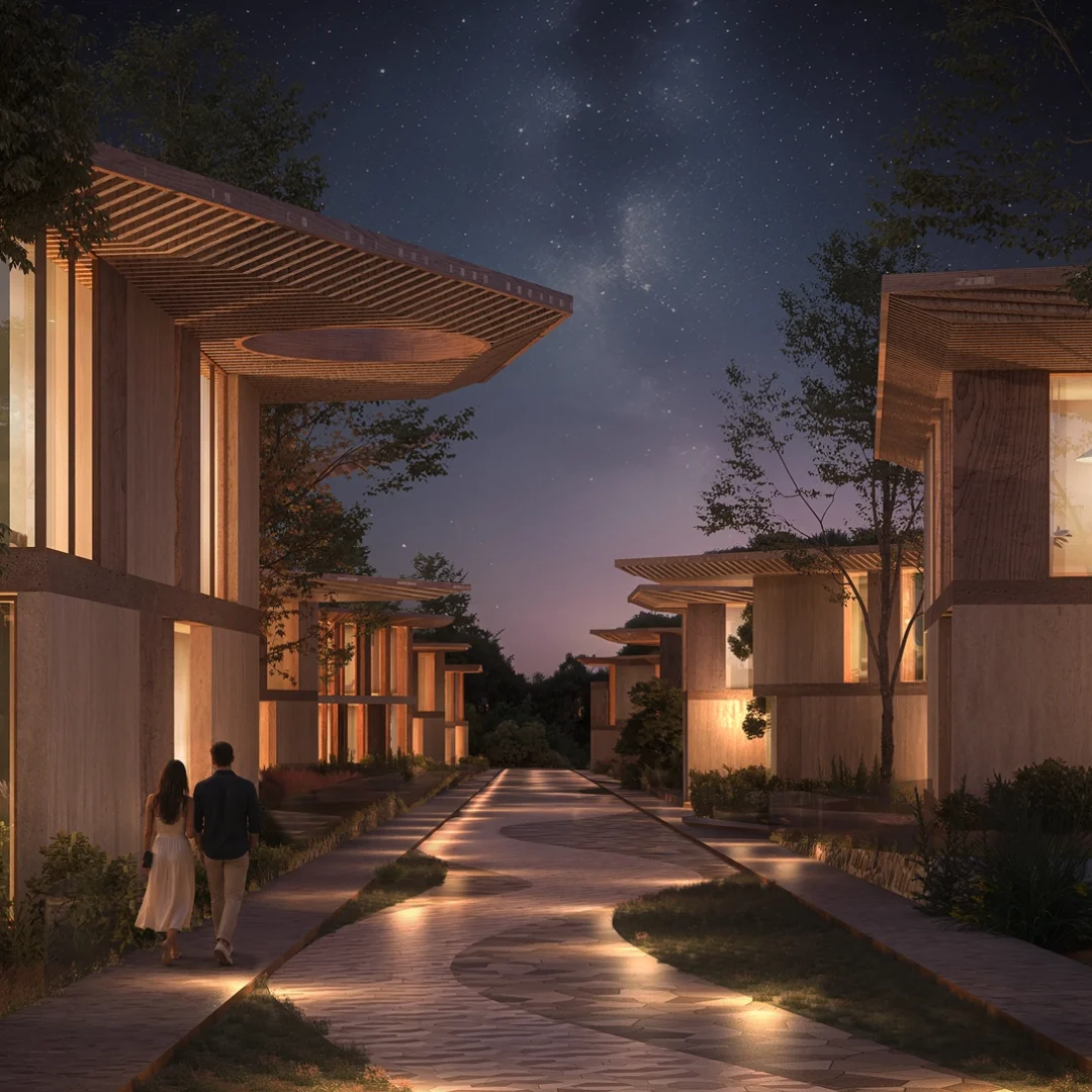 A lantern-lit lane between low pavilions under a starlit sky